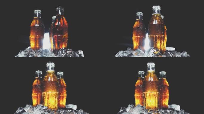 玻璃湿的苏打水在冰块中的旧瓶子在光线中孤立的黑色背景上转成一圈。具有速度斜坡效果的4k慢动作视频。