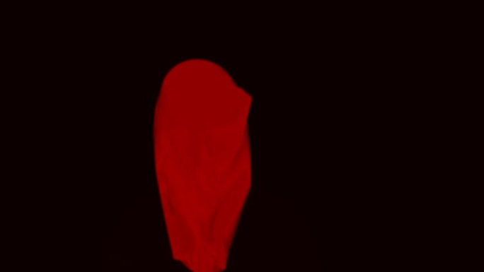 孤立背景上的浮动红色织物。设计。在空中飞行的红色织物上的褶皱。美丽的红色织物在空中幽灵般移动
