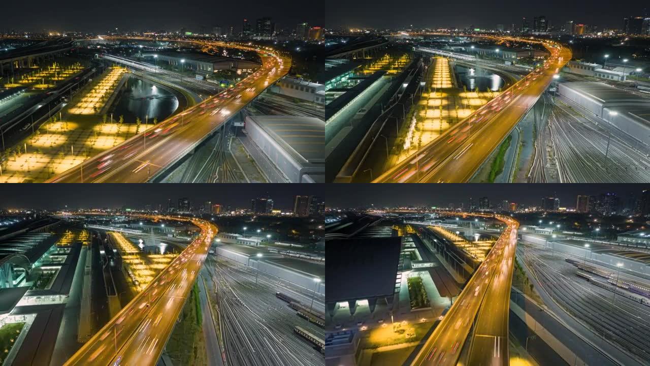 夜间，亚洲城市多车道高速公路或高速公路上的汽车交通运输超时空，无人机鸟瞰图向前飞行。土木工程，亚洲交