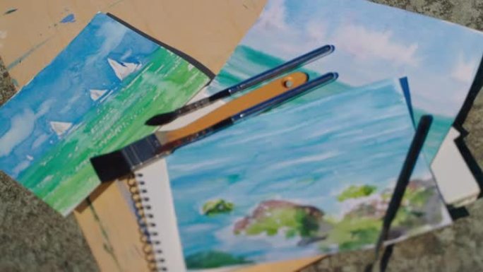 有才华的艺术家和画笔的海景的aquarelle素描