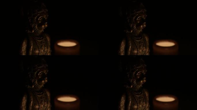 哈努曼人物，印度教的神，用蜡烛的光照亮