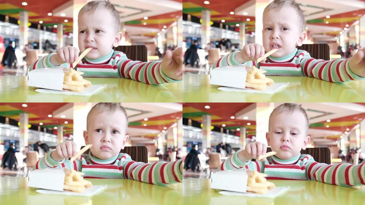 咖啡馆里的孩子拒绝吃炸薯条
