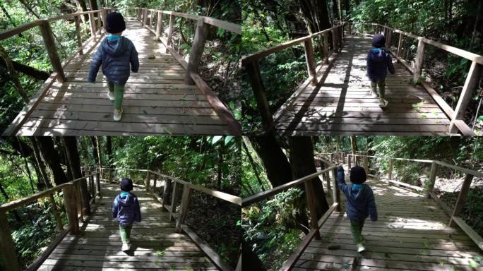亚洲母子假日在国家公园徒步旅行