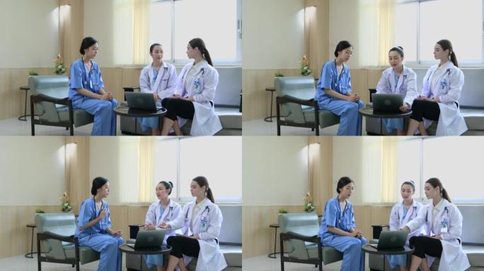 医院的两名女医生为国际医院的新实习医学生提供建议。