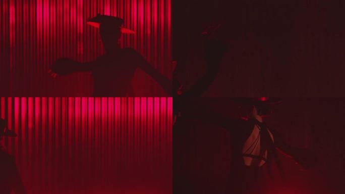 美丽的帽子穿着女孩跳拉丁舞。专业女舞者在红色背景上跳舞弗拉门戈舞，伦巴舞或萨尔萨舞，并带有线条。西班