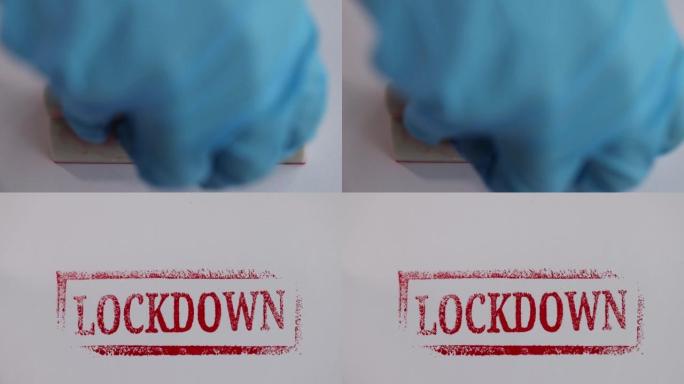 手握橡胶手套将红色锁定邮票放在纸上特写4k电影慢动作