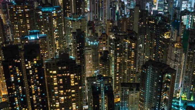 香港是世界上人口最稠密的城市之一，中国夜间住宅建筑的延时视图