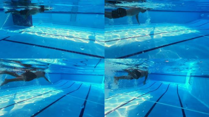 业余水下游泳，家庭视频风格拍摄。自由式游泳。