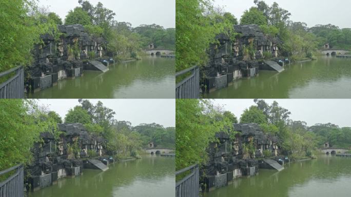 4K实拍，春雨中广州公园湖边的拱桥与假山