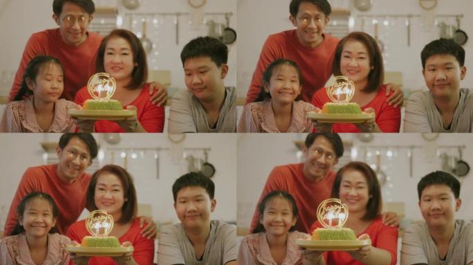 生日庆典上亚洲家庭的快乐时刻。
