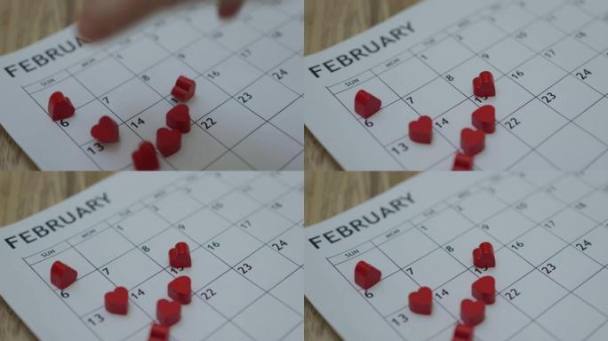 手工扔红色心形砖日历2月14日日期情人节