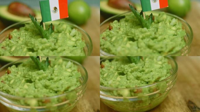鳄梨色拉酱配玉米片和墨西哥国旗。微距拍摄