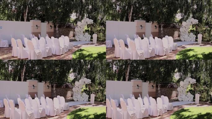 白色椅子婚礼圆拱