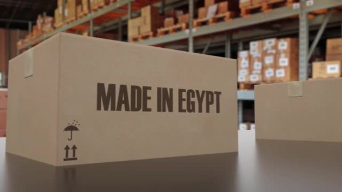 传送带上有埃及制造文字的盒子。埃及商品相关可循环3D动画