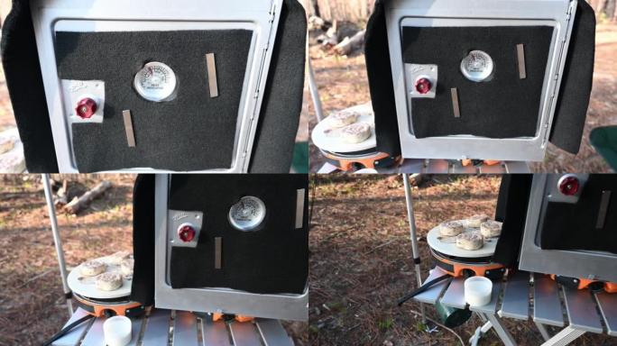 野营炉灶上的野营烤箱