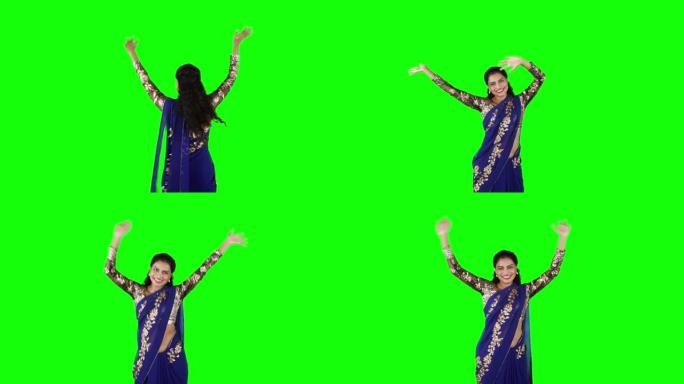 欢快的印度女人在演播室跳舞