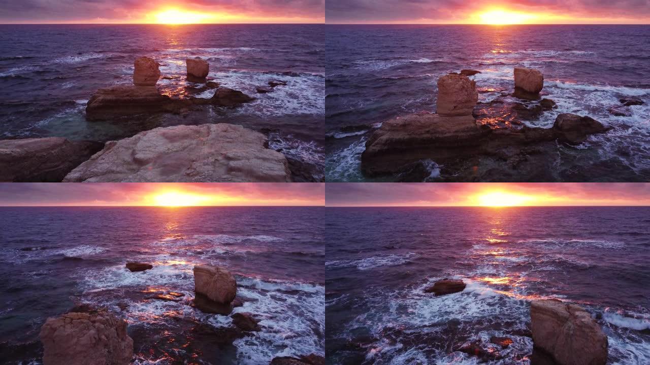 日落或日出时海洋上的自然空中景观，不寻常的岩石海岸上的海浪，海浪冲刷白色悬崖