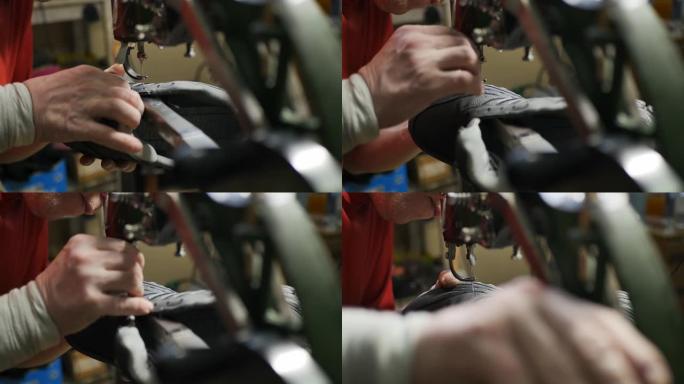 鞋匠开始用旧打字机在运动鞋上缝制新的接缝
