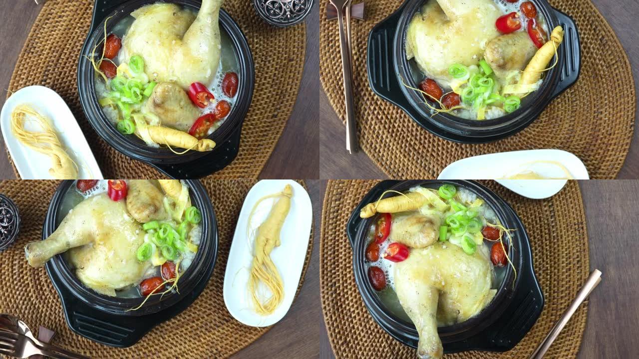 人参鸡汤韩国传统食品在热铁锅，三桂堂或人参鸡汤。