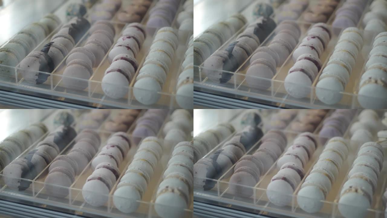 咖啡馆展示了充满甜美的法国糖果，各种柔和色彩的美味杏仁糖。含糖食品增加了含糖饮食者患糖尿病和肥胖问题
