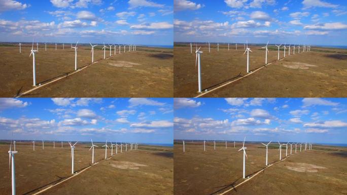 海边附近风力涡轮机的4k视频鸟瞰图