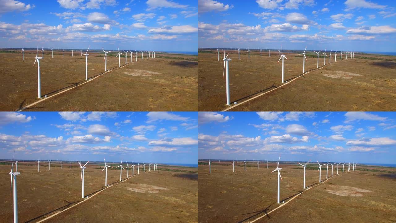 海边附近风力涡轮机的4k视频鸟瞰图
