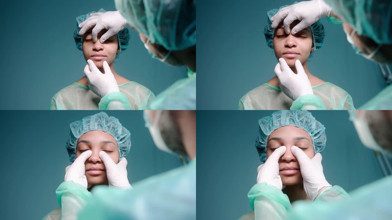 外科医生在隆鼻术前戴着防护手套检查女孩的脸