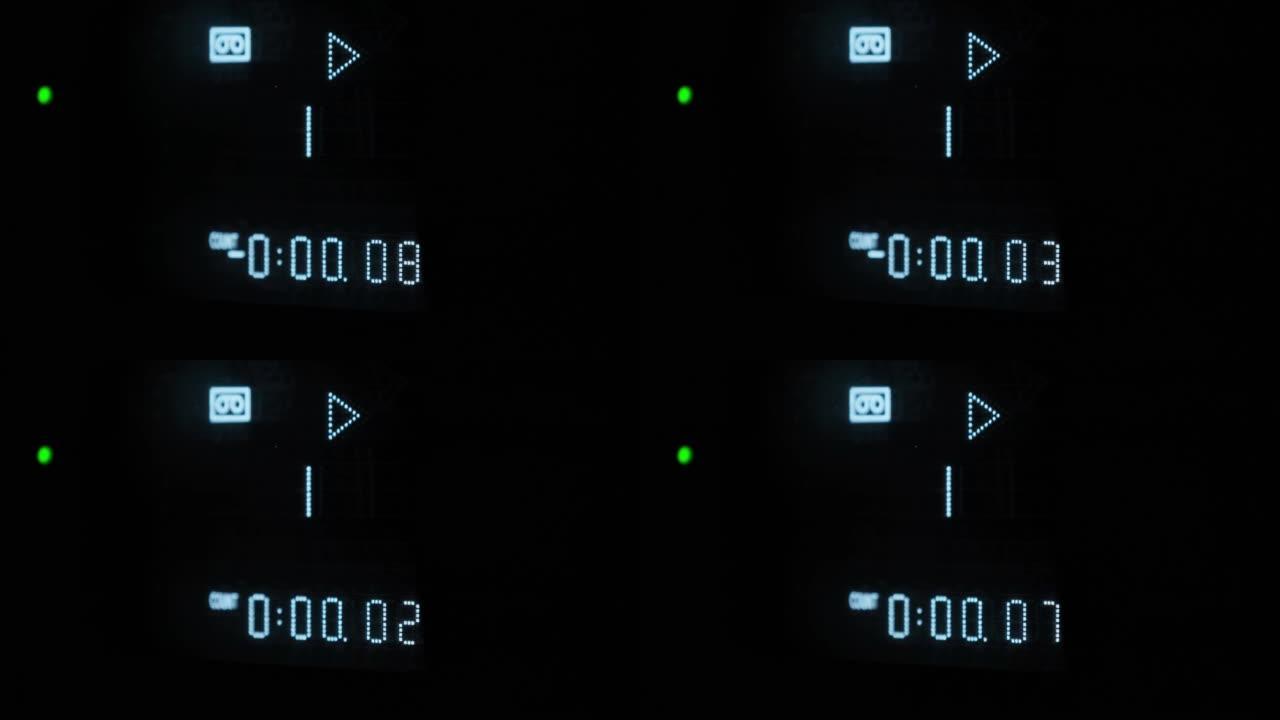 录像机上的电子数字计数器计数时间，复古发光二极管指示灯
