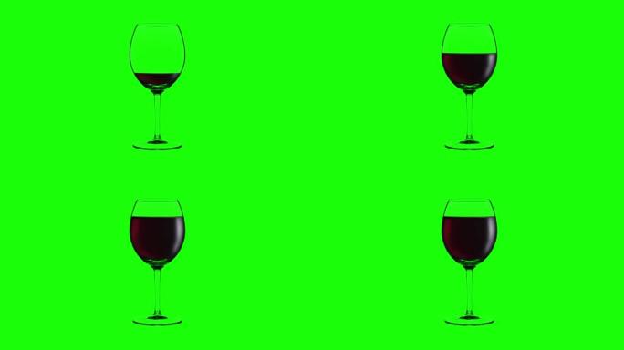 绿色背景上装满红酒的空酒杯