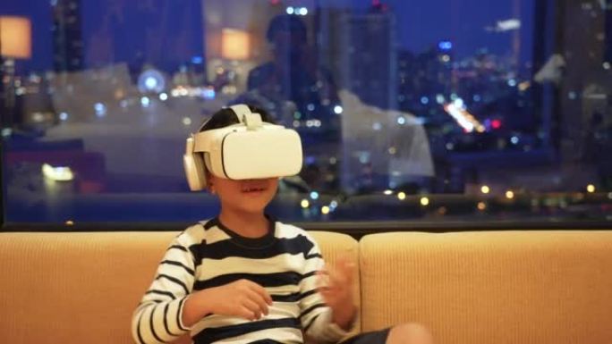 亚洲孩子玩VR游戏和教育。儿童高科技概念