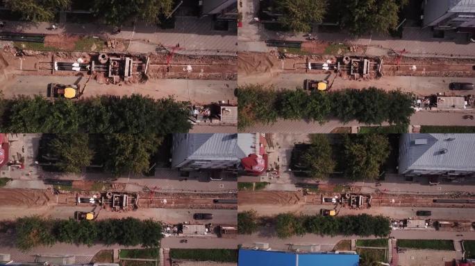 在夏季从上方鸟瞰图修复俄罗斯小城市的供暖主管