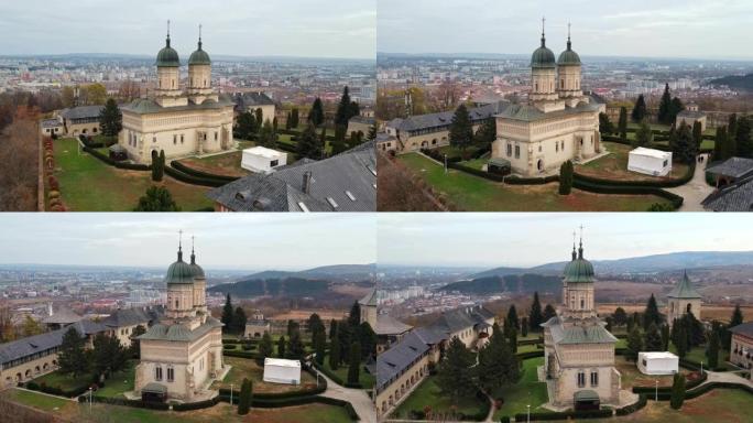 罗马尼亚雅西的Cetatuia修道院的空中无人机视图。主教堂，内院和建筑物，背景上的城市