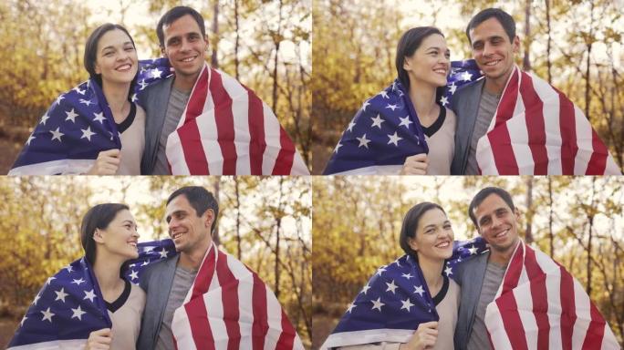 幸福的美国家庭和美国国旗
