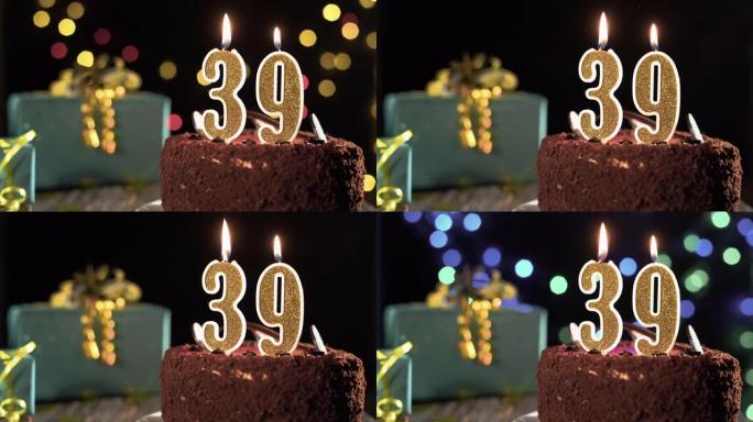 39岁生日，桌子上的甜蛋糕上有39号生日蜡烛。打火机上的火，吹灭节日蜡烛。