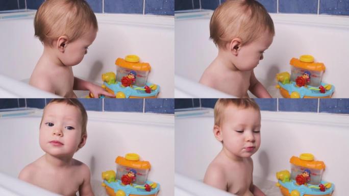 可爱的小女孩洗澡，玩五颜六色的玩具。照顾孩子的卫生。4K
