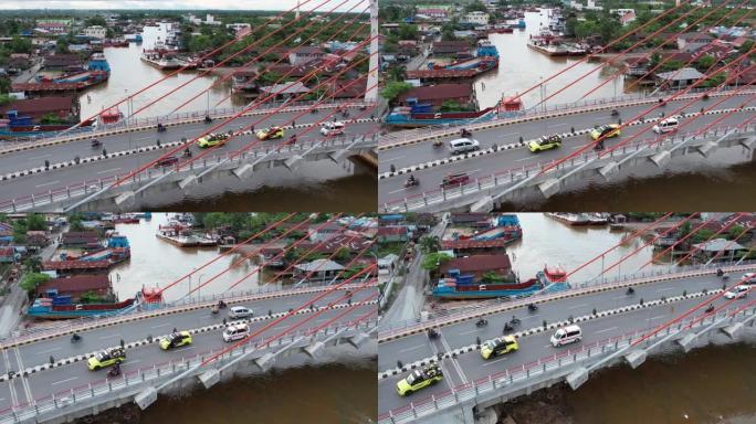 桥塞阿拉拉克。Banjarmasin桥与船河的空中Martapura河地标