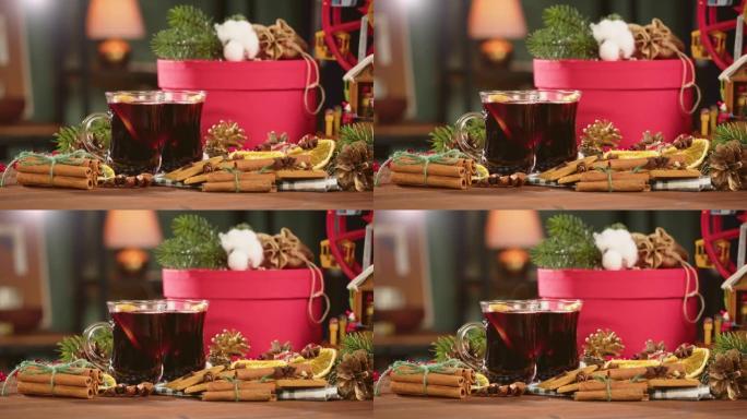 玻璃杯、谷胱甘肽和肉桂特写热酒。八角甜红葡萄酒。传统的冬季饮料。圣诞假期和新年时间概念。