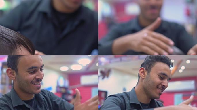 理发师在理发店用剪刀剪头发