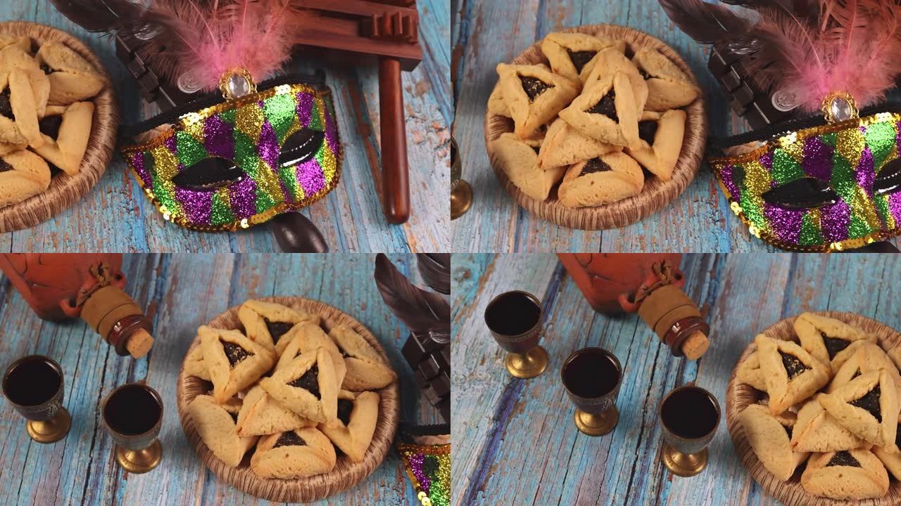 哈曼斯耳朵饼干噪音发生器和普im节庆祝犹太狂欢节节日面具