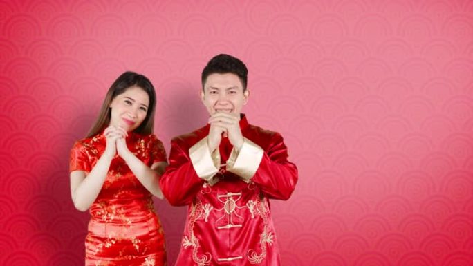 亚洲夫妇问候中国新年快乐