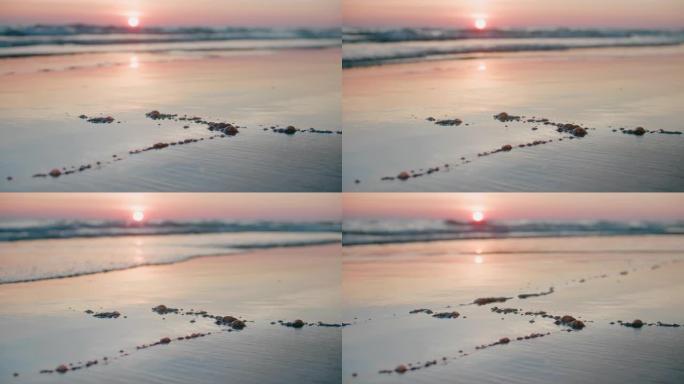 在日落背景的海滩上漏油，这是一个原油污染的海滩