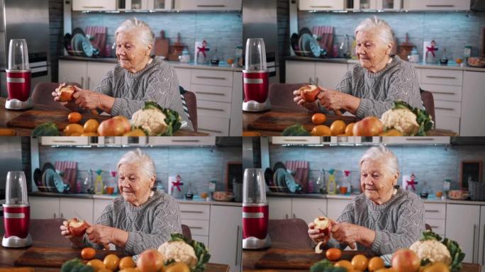 老退休妇女用刀剥苹果