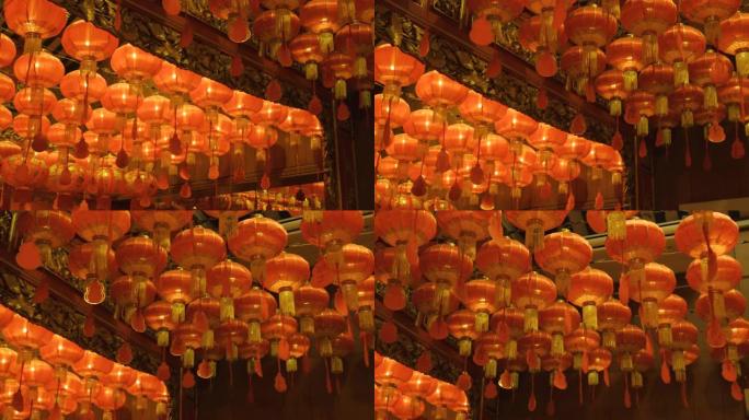 挂在天花板上庆祝农历新年的橙色灯笼。农历新年。曼谷的龙庙。泰国。