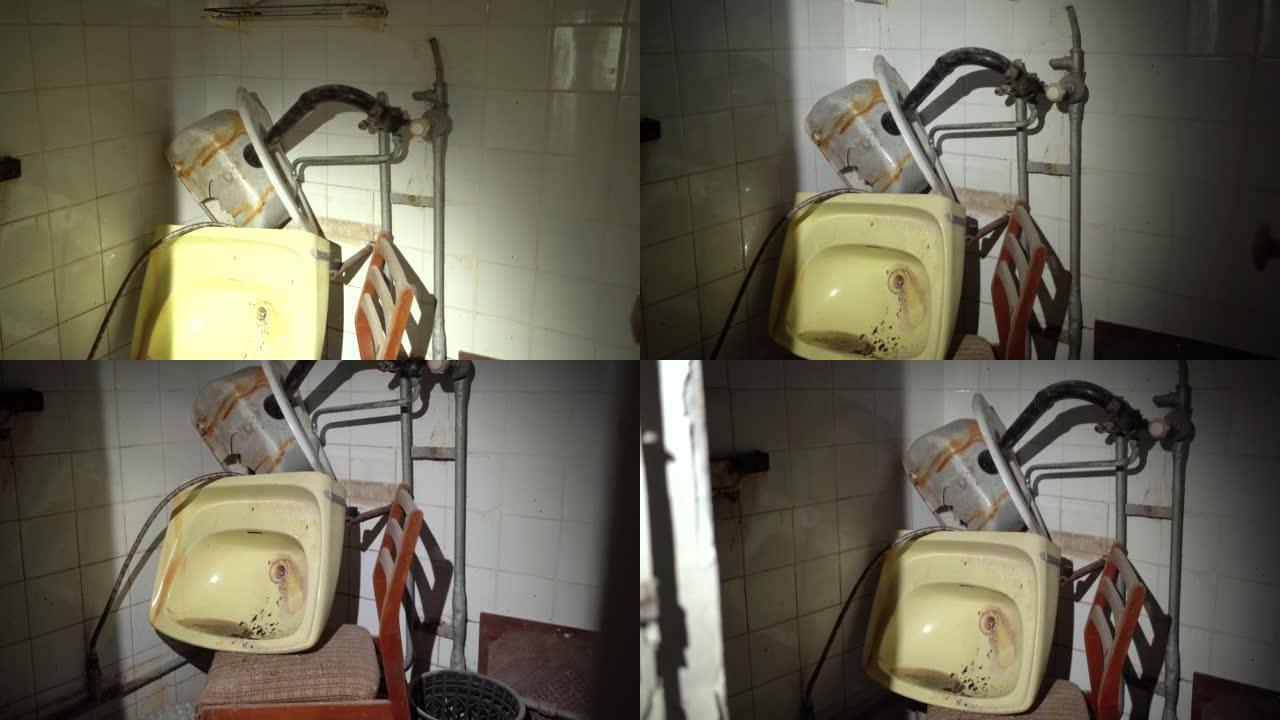 一栋被毁建筑的洗手间，破碎的陶瓷水槽。在一栋被毁的建筑里用手电筒的视点。