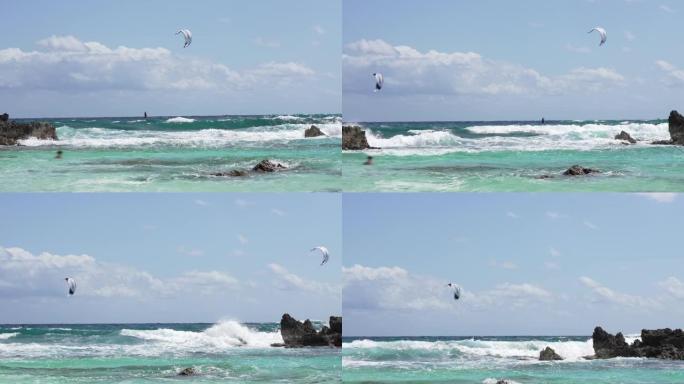 加勒比海的男人和女人风筝冲浪