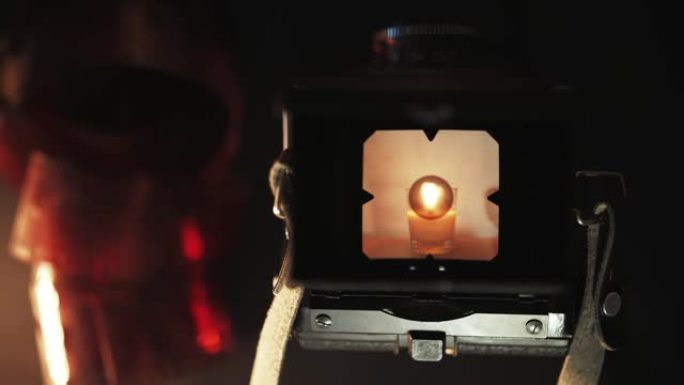 旧相机蜡烛的镜头拍摄设备古老工具相机发展