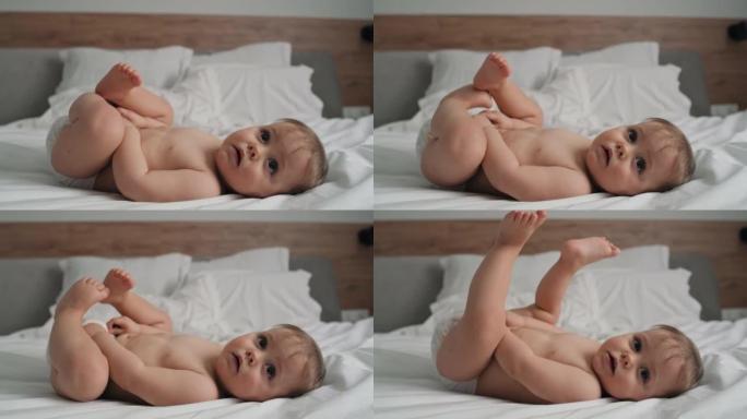 可爱的小女孩洗澡后躺在床上的视频。用8k的红氦相机拍摄。