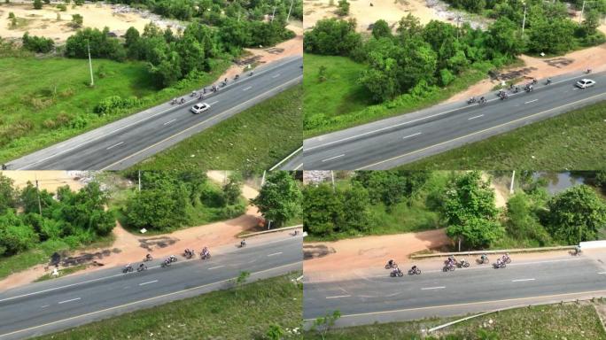 在泰国宋卡府乡村某处的道路上骑自行车的空中射击组