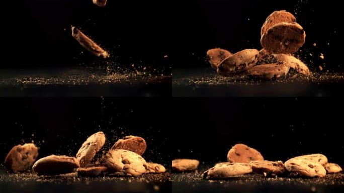 带有巧克力块的饼干落在桌子上并碎了。拍摄的是1000 fps的慢动作。