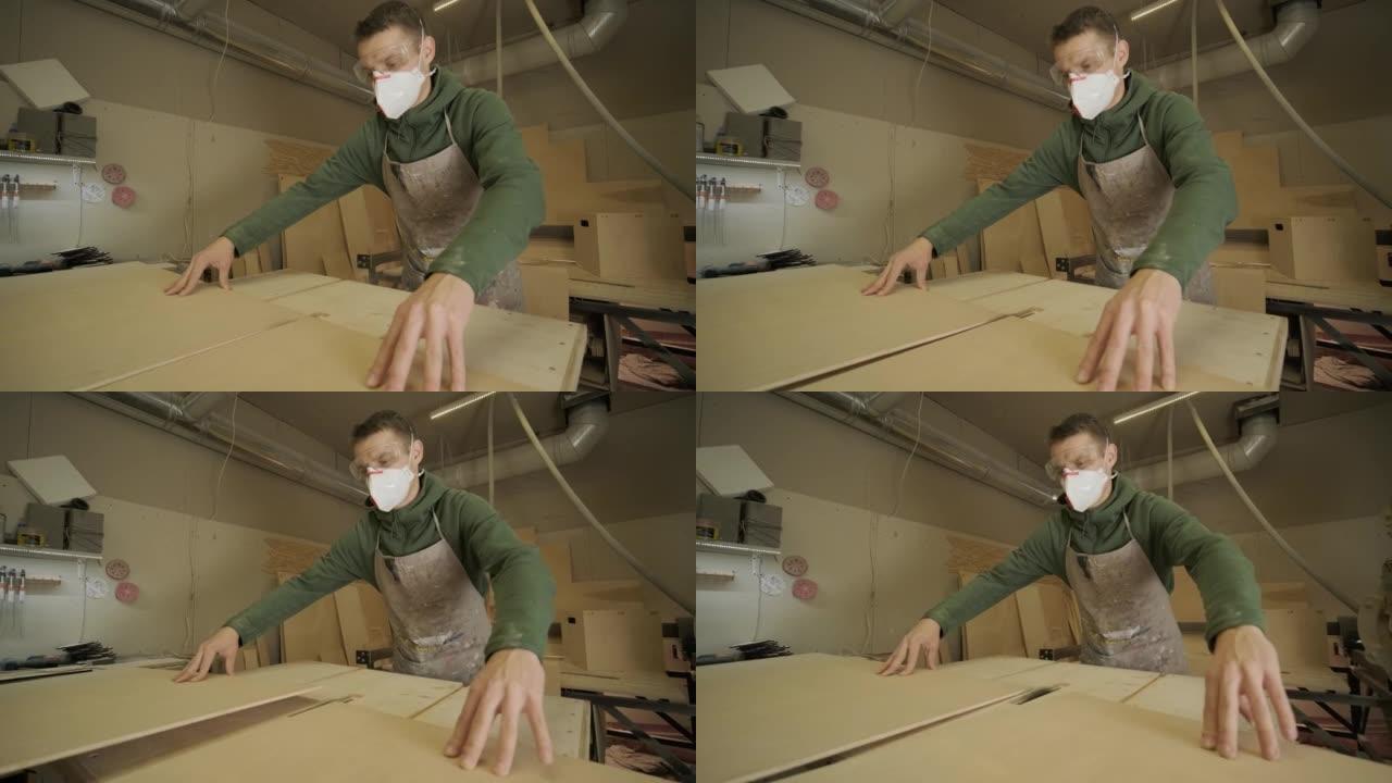 面具和眼镜专业木工检查木材原料、木板、胶合板